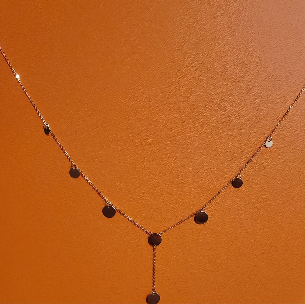 Brand new 14kt yellow gold disc lariat necklace